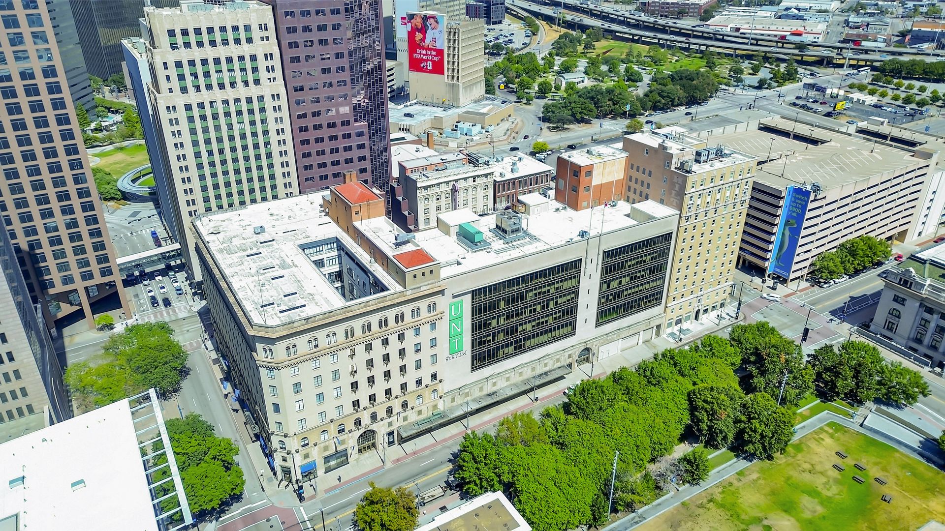 Aerial view of the roof of 1900 Elm among downtown Dallas towers