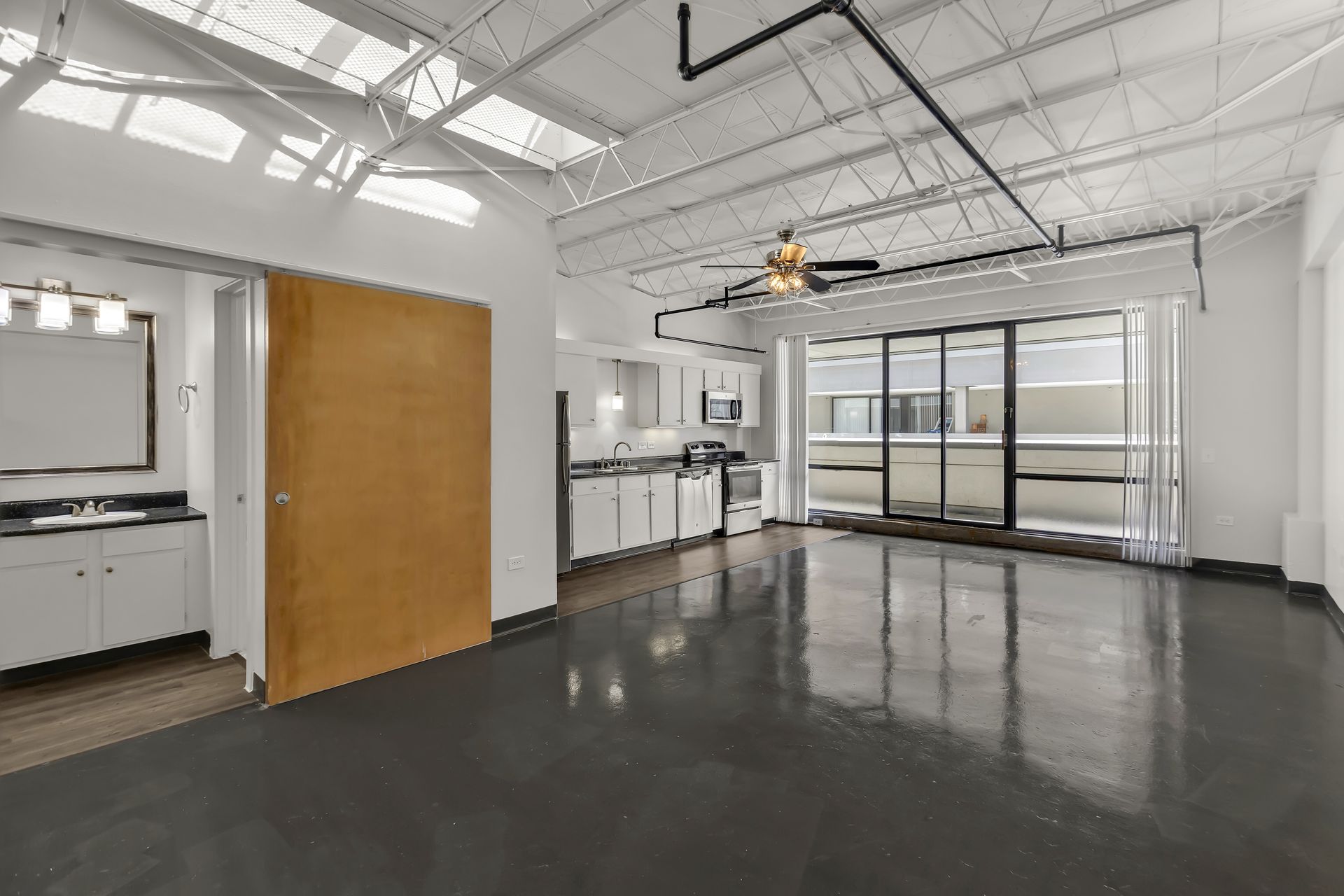 Large Loft 808 with a private balcony door and open kitchen, 1900 Elm Lofts